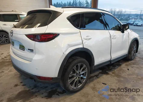 2021 Mazda Cx-5 Signature z USA, uszkodzony, nr VIN JM3KFBEY8M0346148